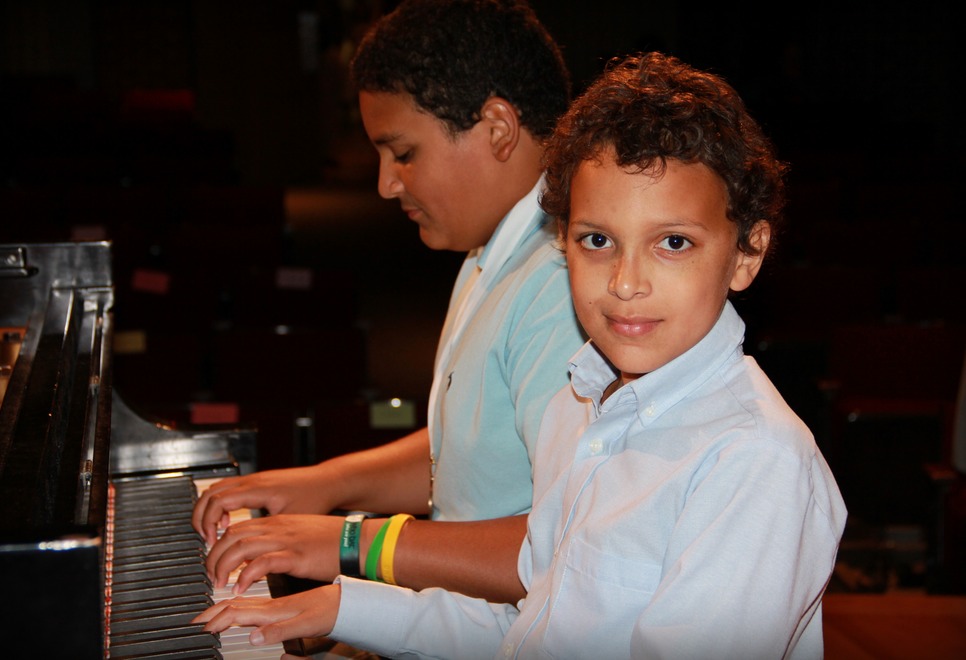 Brothers Taking a Picture Together After the Piano Recital